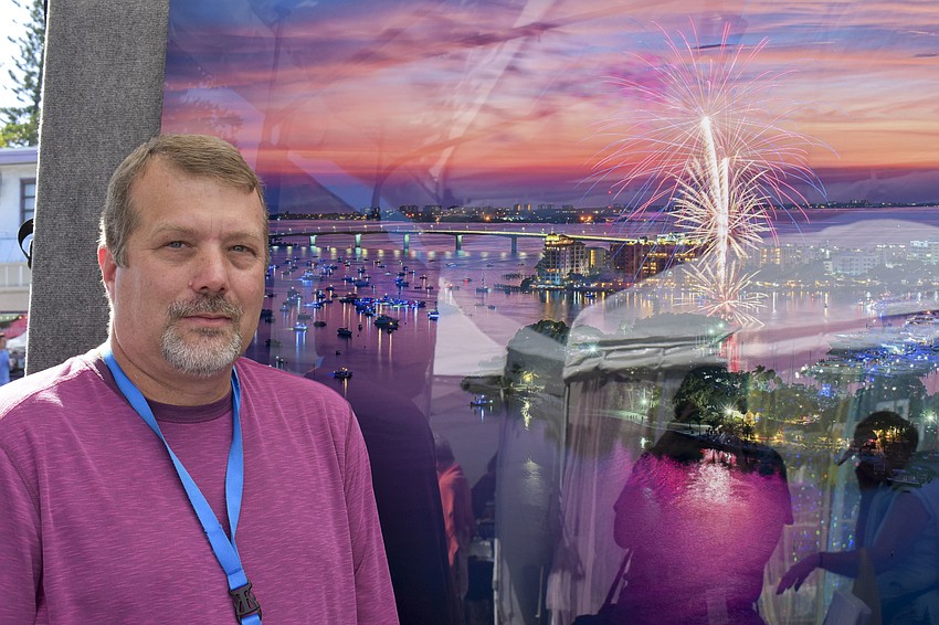 Craig Sheffield with one of his photos of Sarasota.