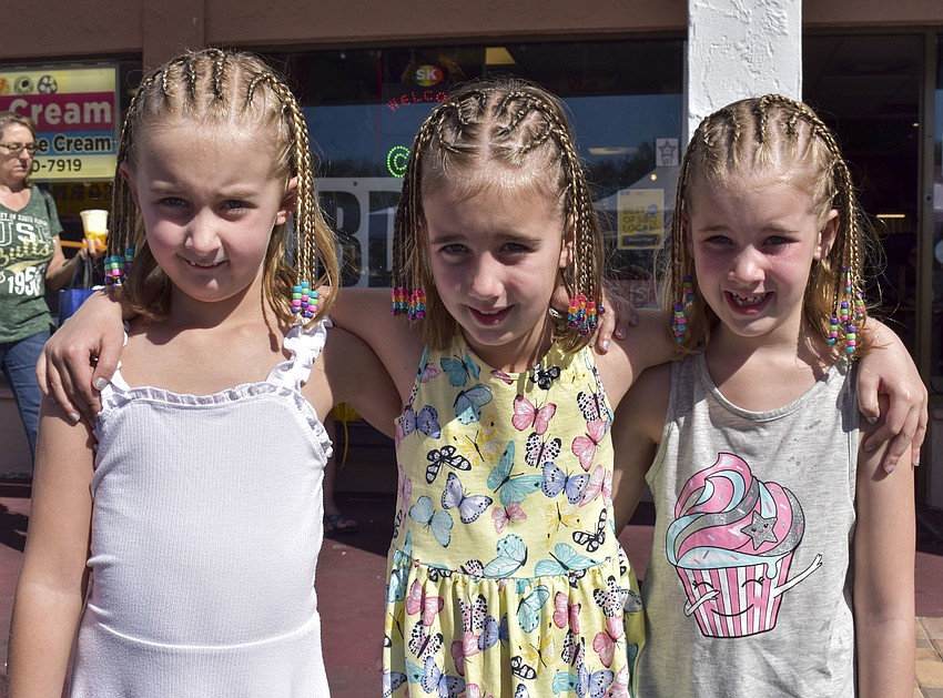 Seven-year-old triplets Madison, Dylan and Quinn Damato