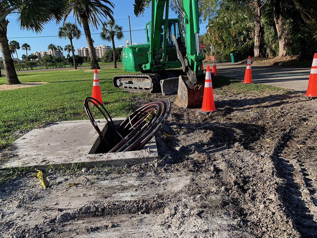 Workers have installed equipment pads and conduit on Sloop Drive in the southern end of Longboat Key.