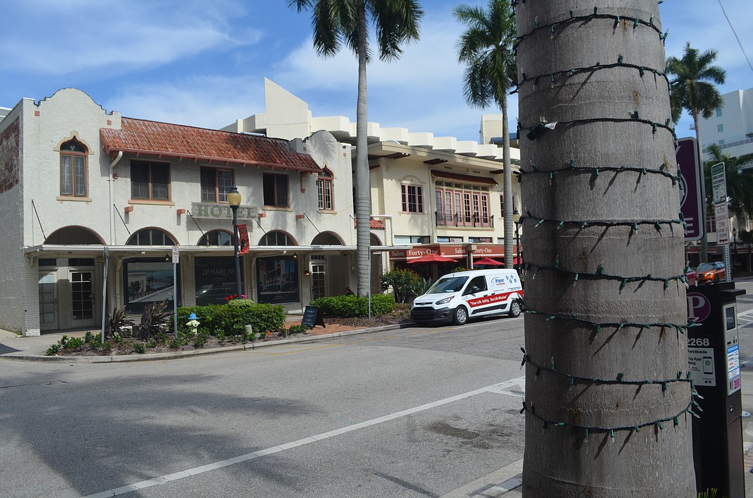 Palm Avenue merchants paid to install seasonal tree lights on the street late last year, but the city must approve a plan to allow for permanent lighting on certain downtown streets.