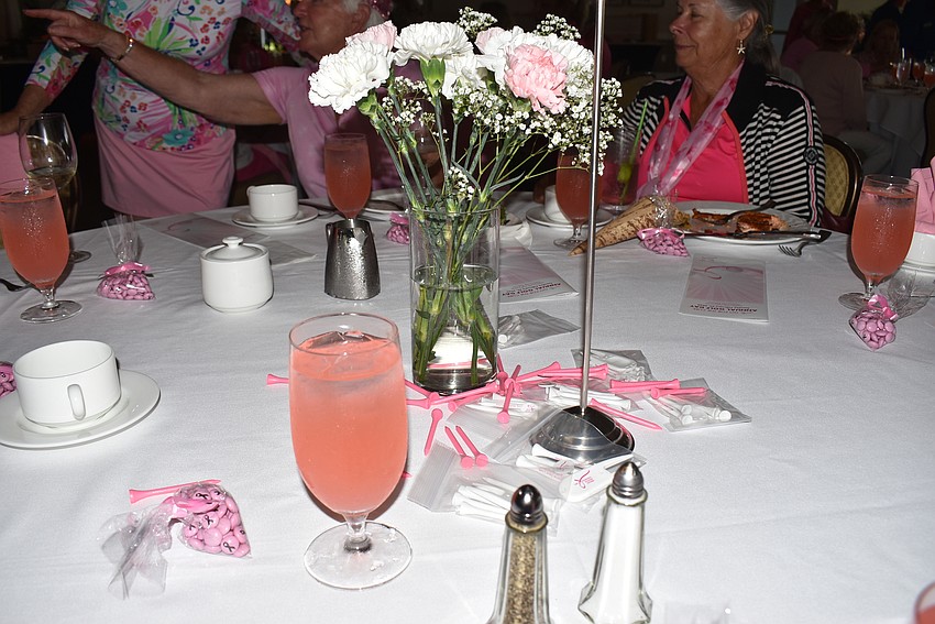 Pink decorations dotted every table.