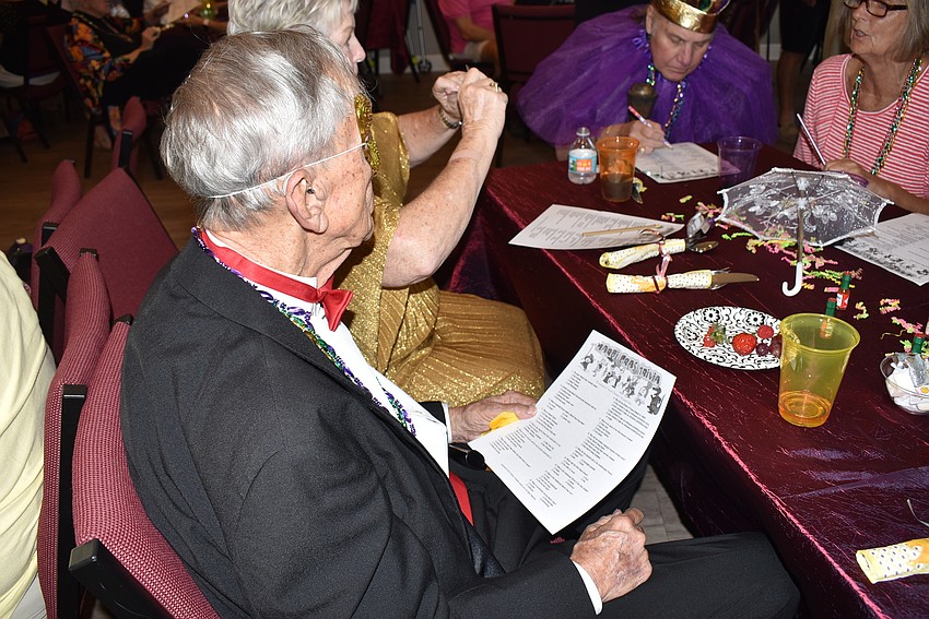 Mardi Gras trivia was on all the tables.