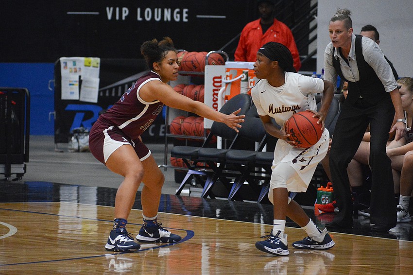 Braden River senior Julia Rodriguez locks down Wekiva's Shadaria Smith.
