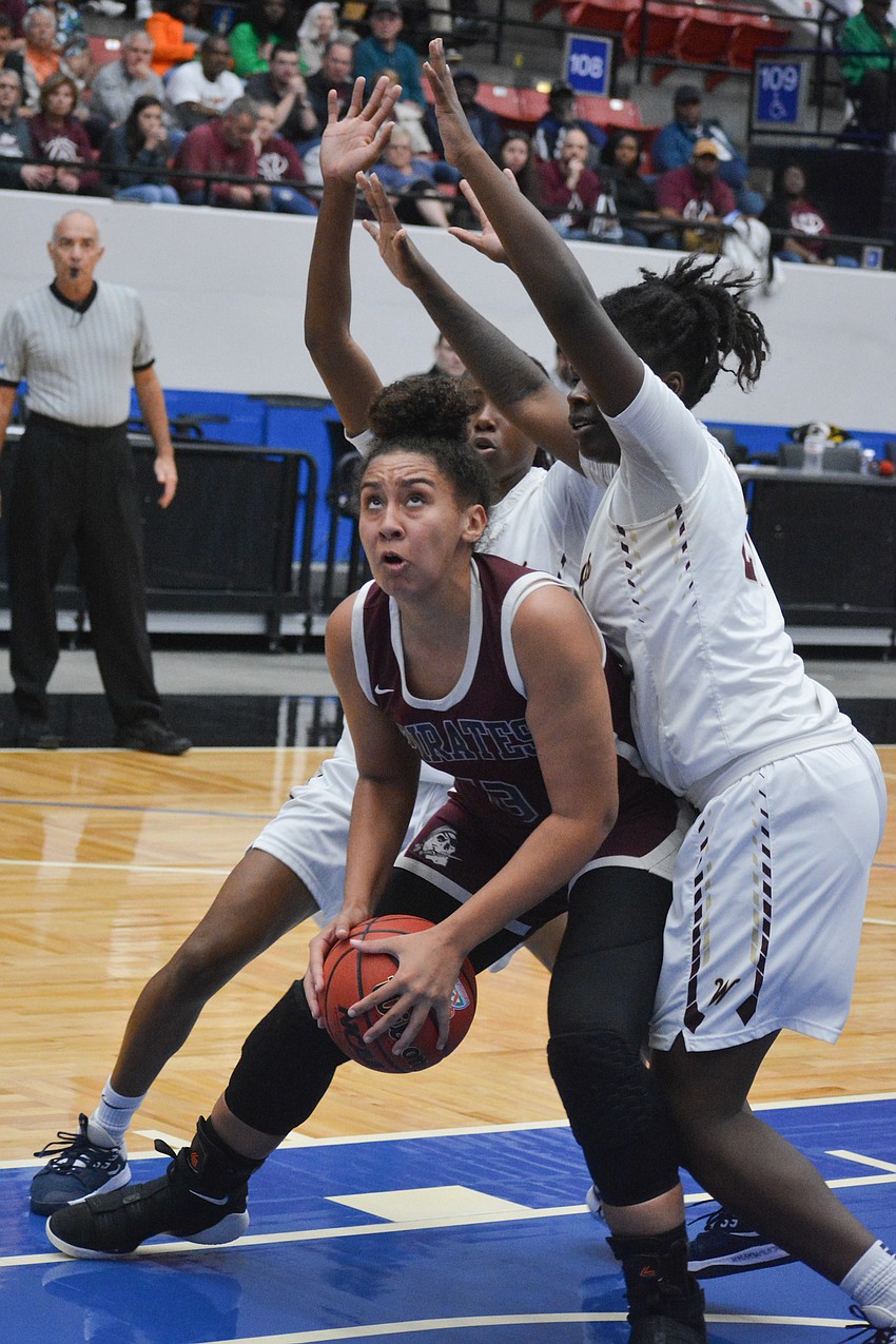 Braden River sophomore Bella Patterson battles in the post.