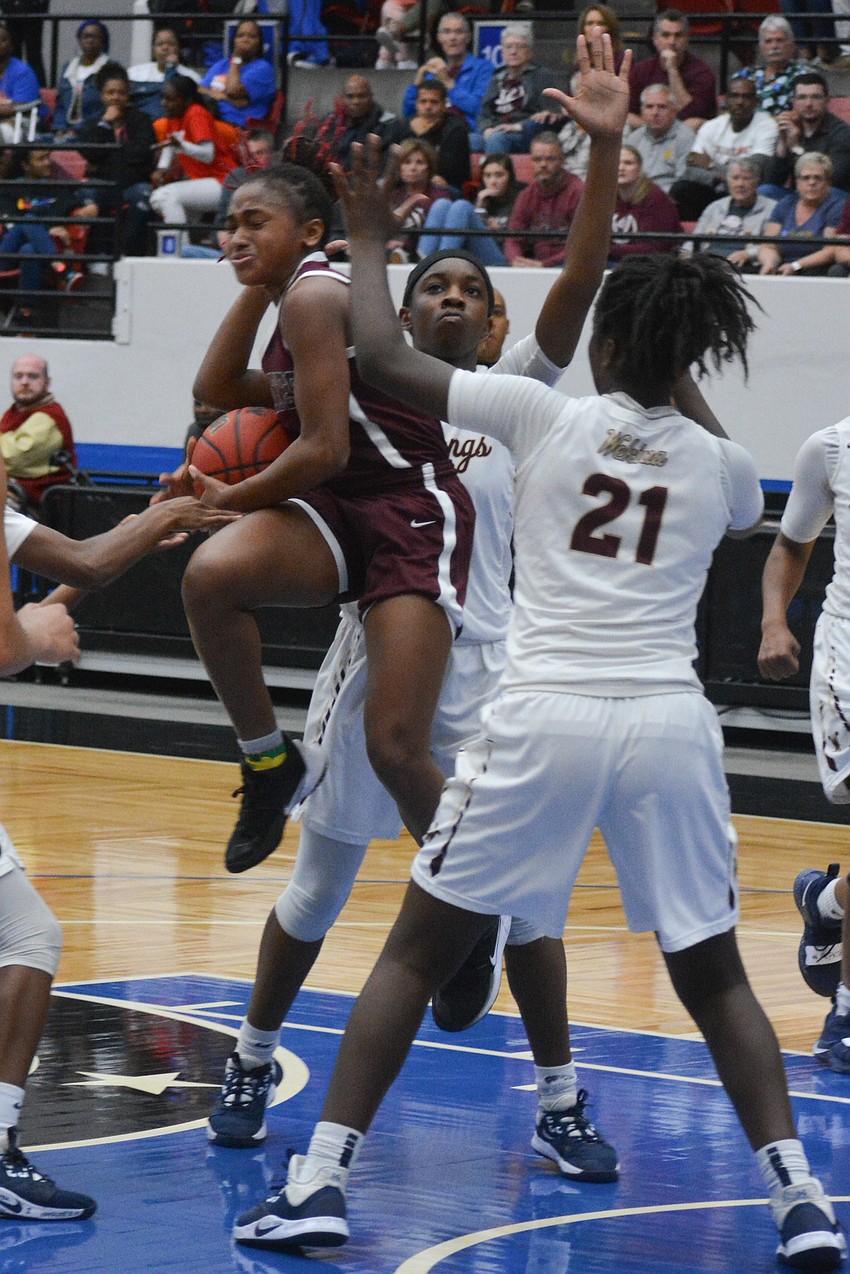 O'Mariah Gordon gets fouled by Wekiva's Danesha Boles.
