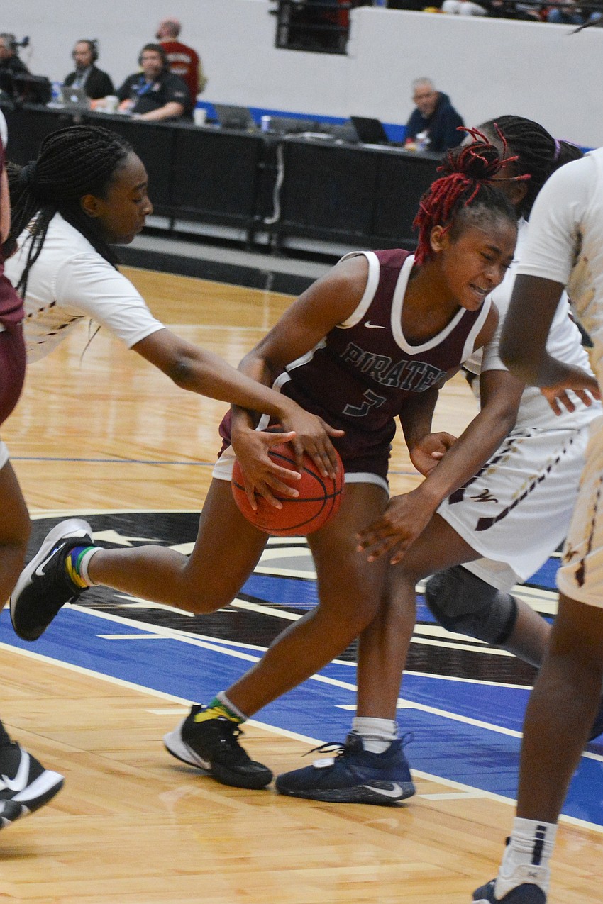 O'Mariah Gordon drives the lane. The junior guard hit eight of her 16 shots on the night.