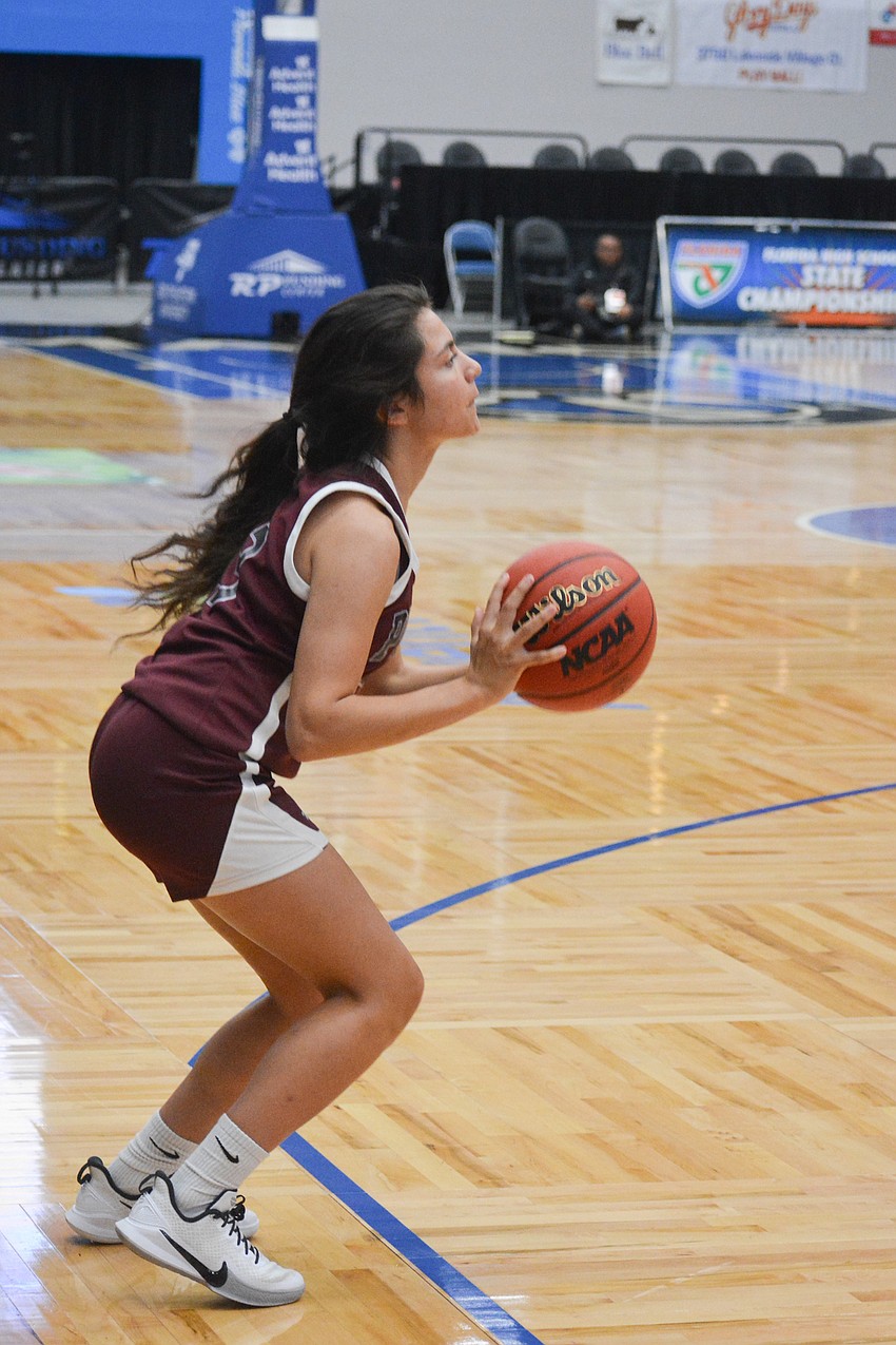 Braden River junior Ellie DiGiacomo jumps and fires a three point attempt. She hit three long range shots on the night.