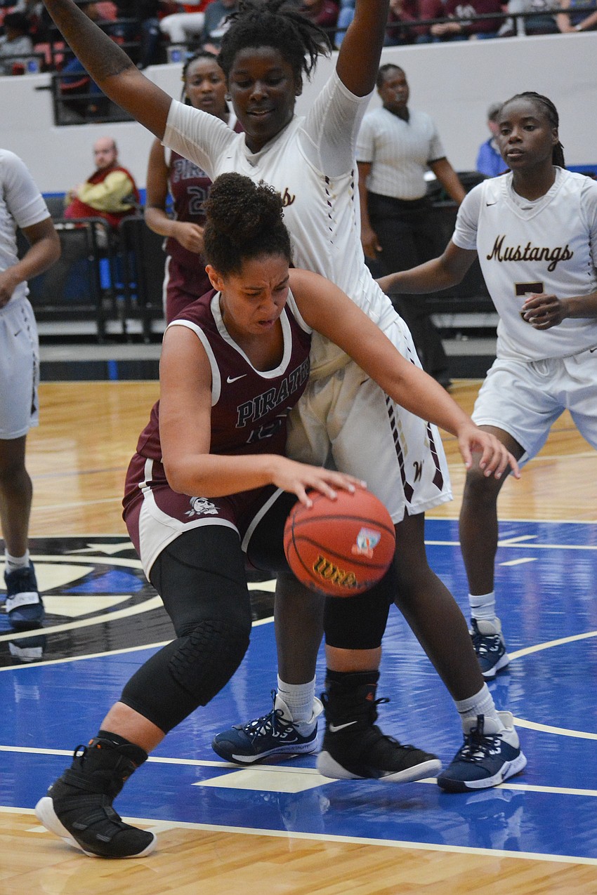 Bella Patterson backs down a Wekiva defender.