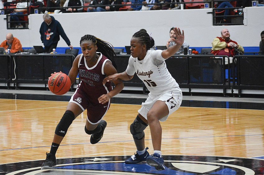 Aaliyah Capers beats Wekiva defender Emmy James off the dribble.