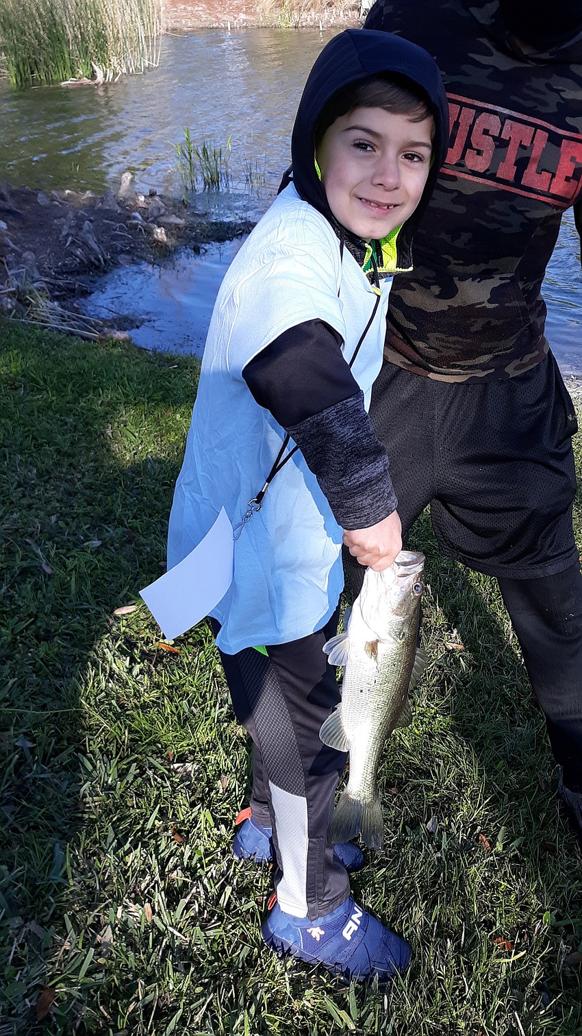 Tara Elementary School 7-year-old Ethan Tirado finished third with his 10.5-inch bass. Courtesy photo.