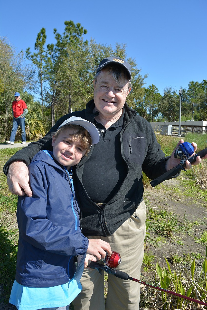 Lakewood Ranch 9-year-old Ryan Lahey pairs with his grandpa, John Mayes. They also fished with Lahey's brother, 5-year-old Bennett, and dad, Michael.