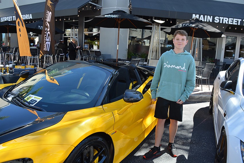 Venice 15-year-old Paxton Barrick even got to sit inside this McClaren 7205. 