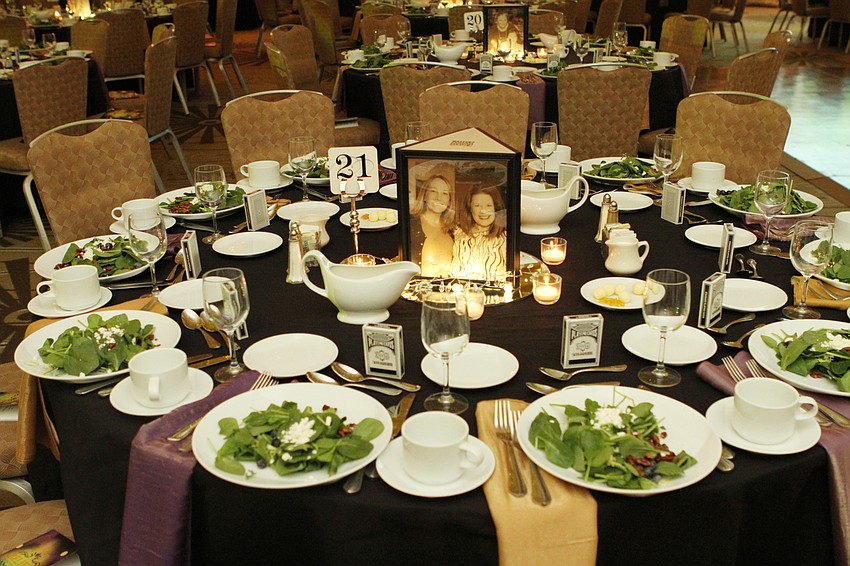 The center's supporters had photos to match their tables