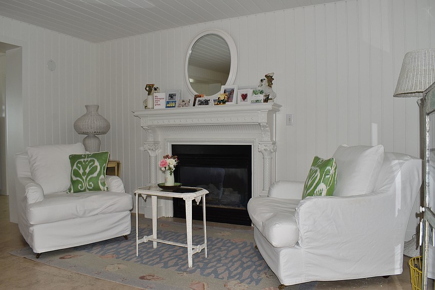 One seating area downstairs boasts a fireplace.