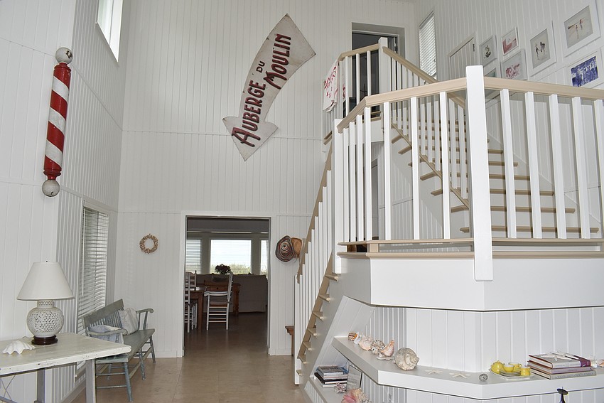 The open entryway draws guests into the home.