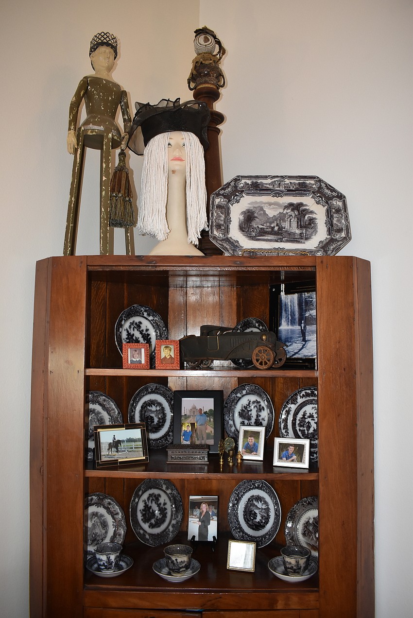 Collectibles and memorabilia decorate a shelf in Lammers' bedroom.
