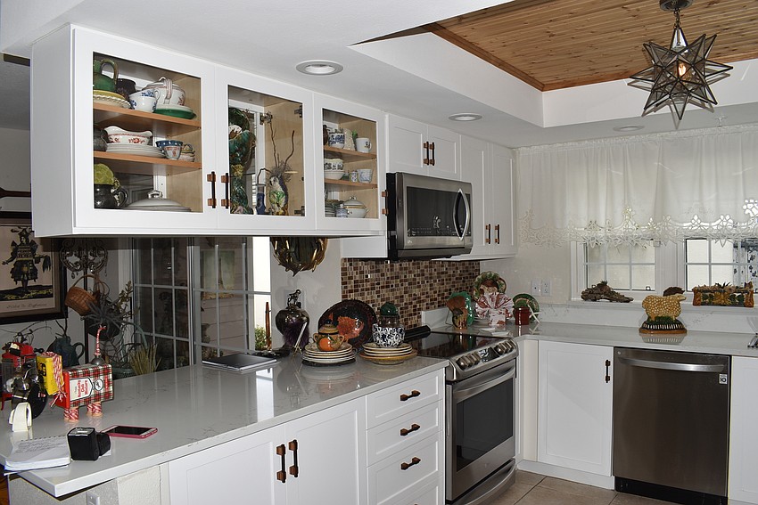 Lammers' kitchen is stocked with kitchen products and art pieces.