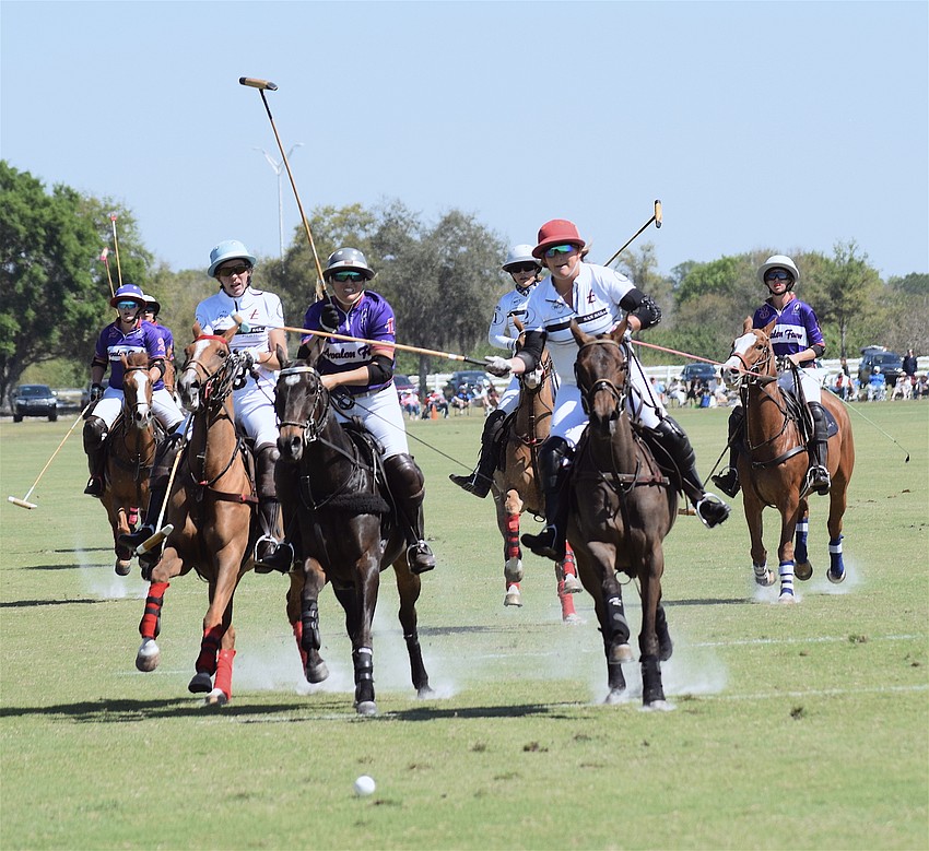 Meghan Shader of Avalon Farms and Kendall Plank of San Saba race ahead of the field during Sarasota Women's Challenge action.