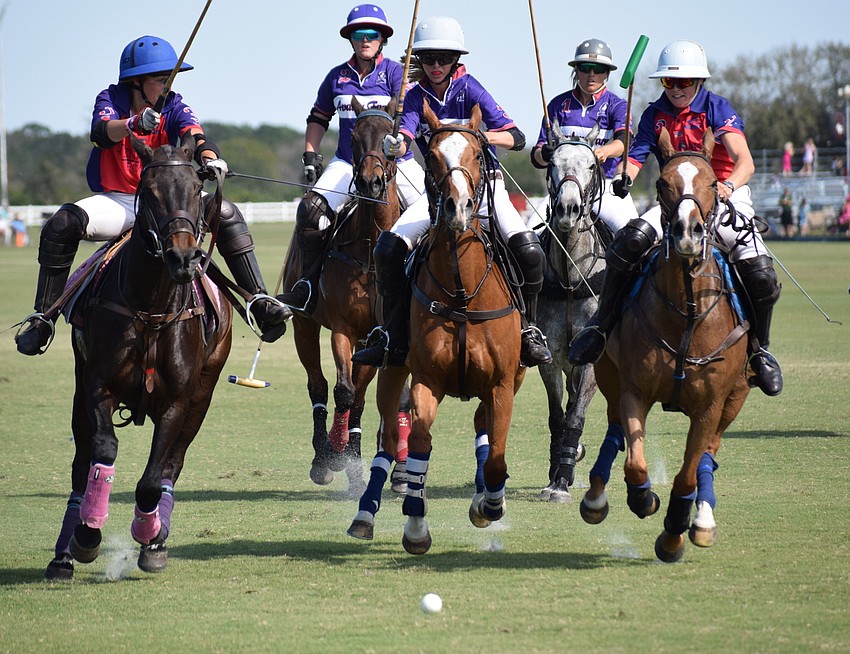 Izzy Parsons of Ten Oaks, Kylie Sheehan of Avalon Farms and Eliza Jacobellis charge in front of the pack.