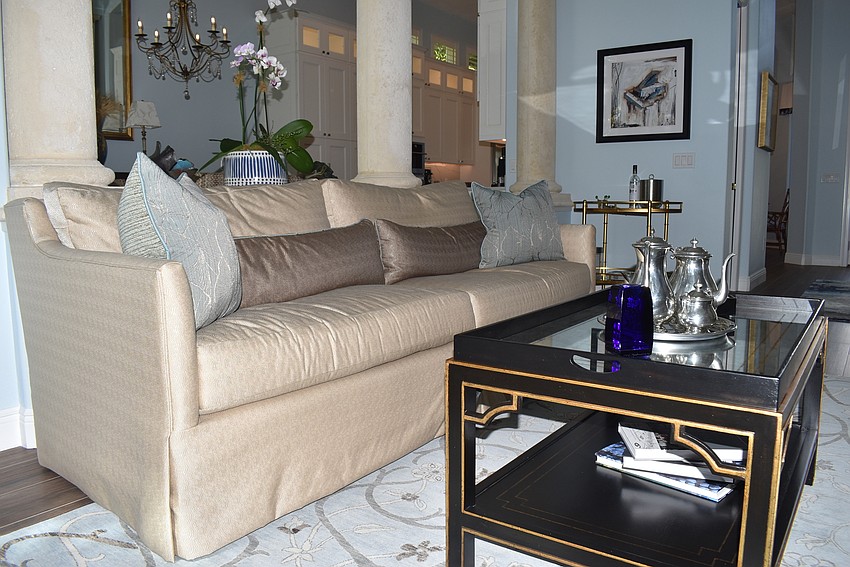 Dark pieces accent the blue and white.