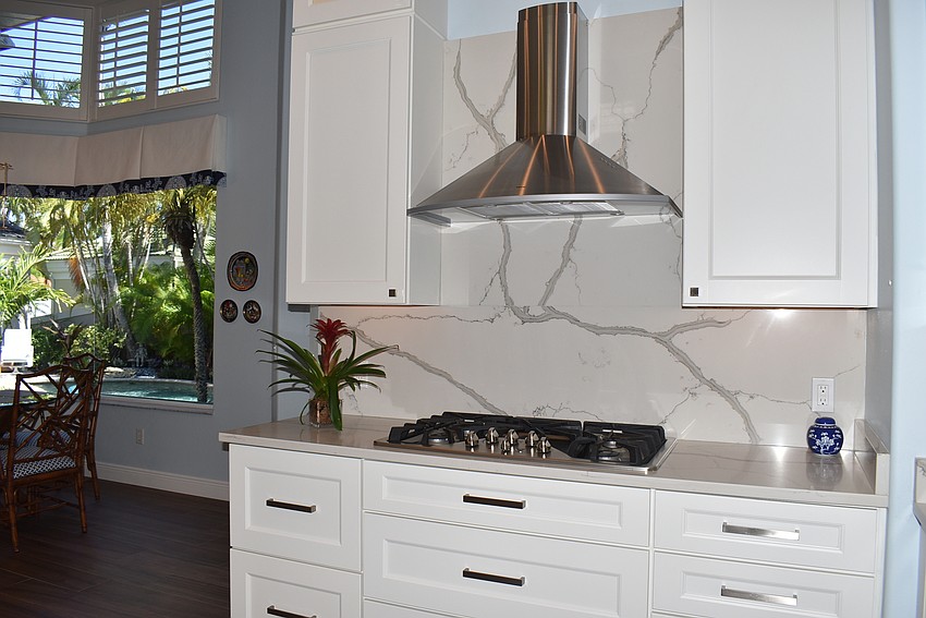 The kitchen is long and has plenty of room for cooking and entertaining.