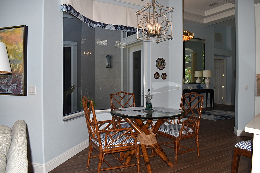The dining area sits near the front of the home just off the kitchen.