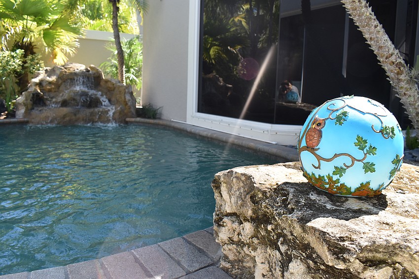 A bubbling water feature welcomes guests into the home.