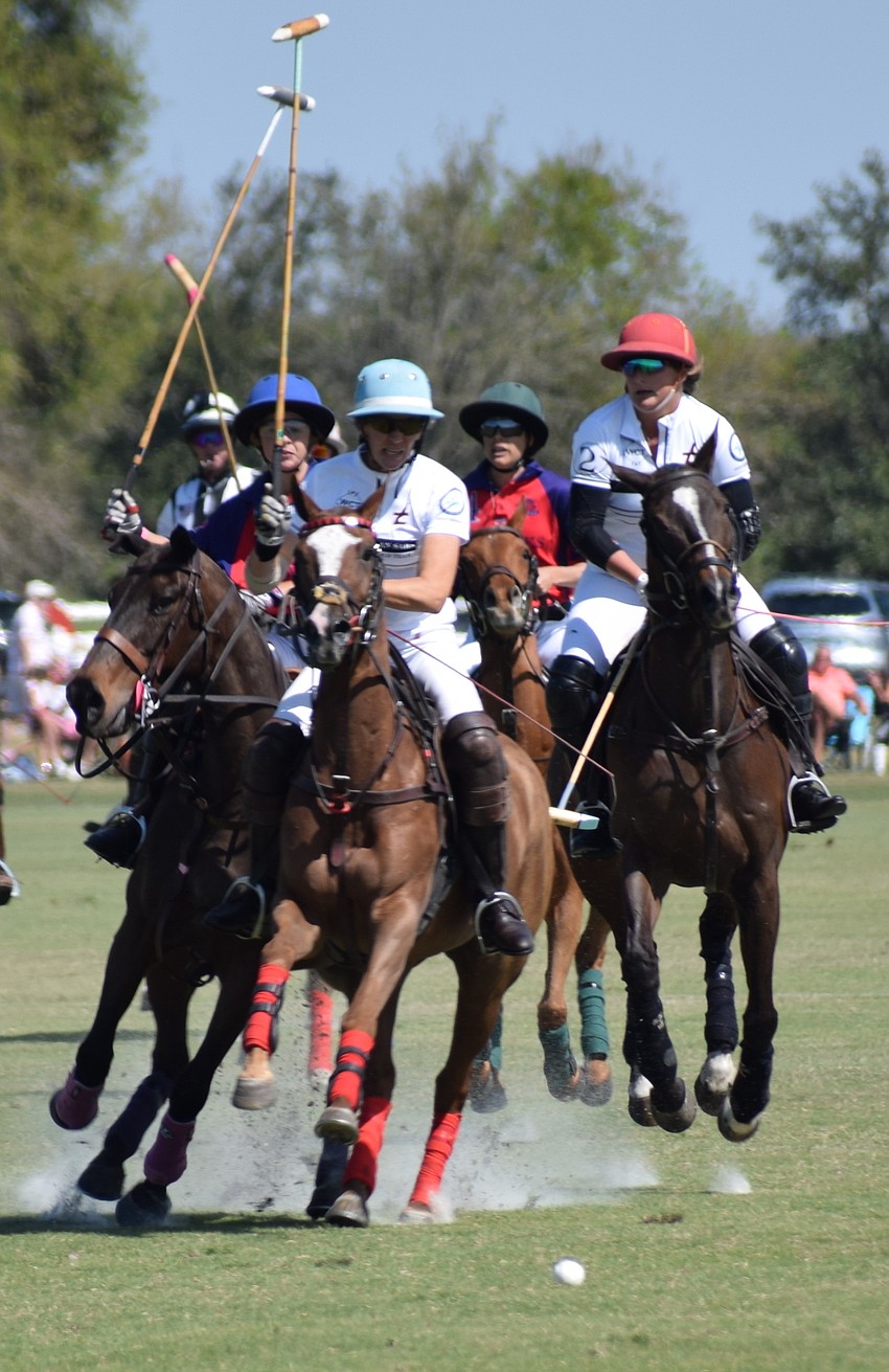 San Saba's Clarissa Echezarreta leads a stampede of players toward the ball.