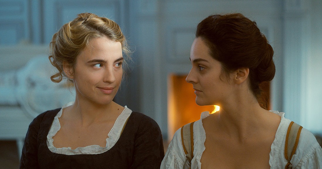 AdÃ¨le Haenel and NoÃ©mie Merlant  defy defy 18th century conventions when they cannot deny their mutual attraction in "Portrait of a Lady on Fire." (Courtesy photo)