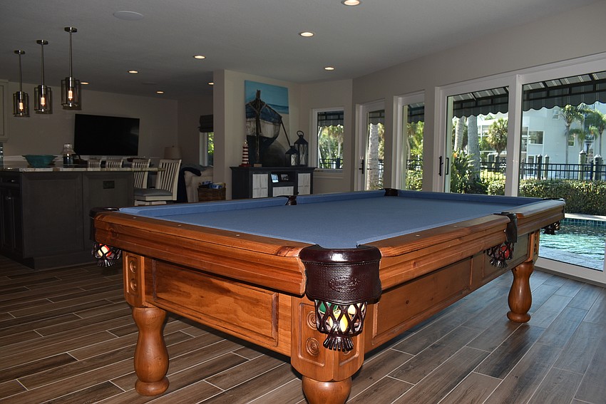 The Yahns have a pool table in their large living space as well.