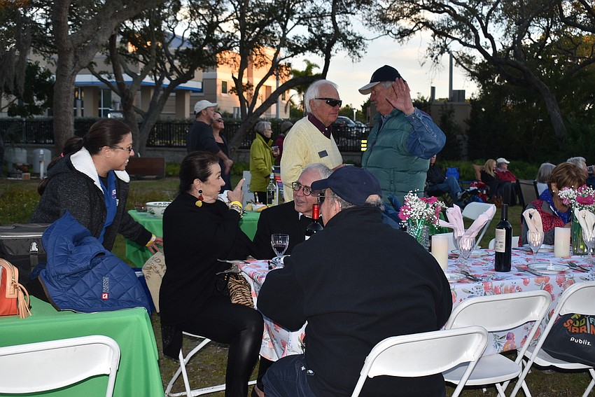 Attendees chatted throughout the evening.
