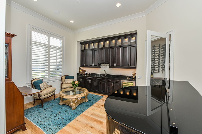 The room in the front of the home features a grand piano. Photo courtesy of Angela Nutter.