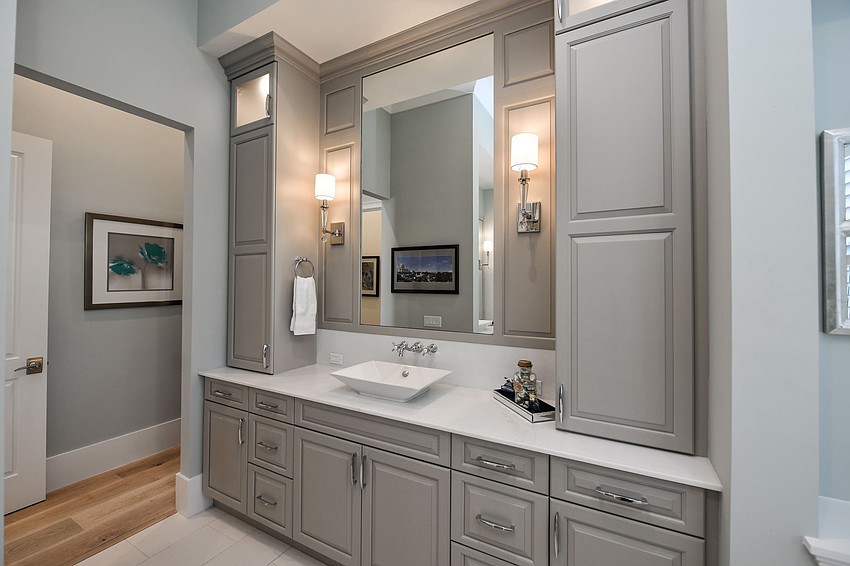 Gray fixtures accentuate the clean lines in the bathroom. Photo courtesy of Angela Nutter.