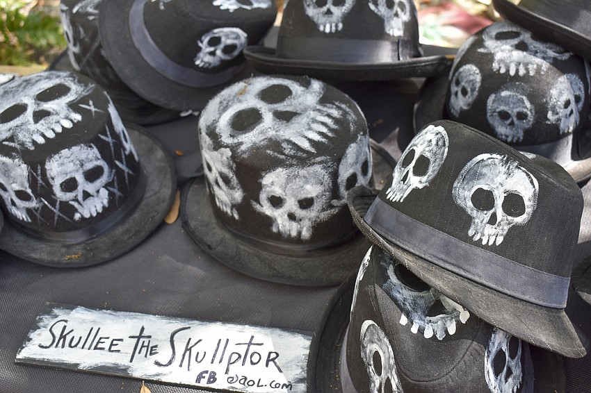 Skullee the Sculptor creates skull pots, hats and more.