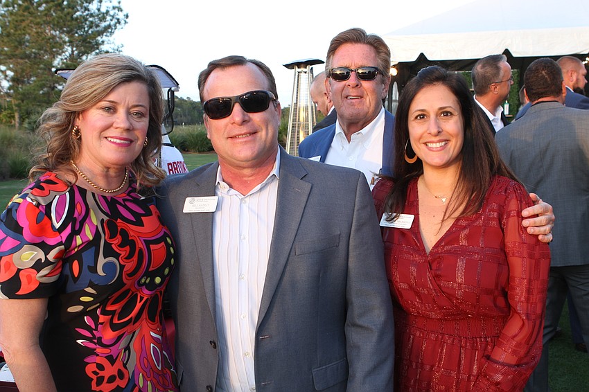 Robyn and Boys & Girls Clubs of Sarasota County president Bill Sadlo with  Mike Doyle and Yolanda Mancha