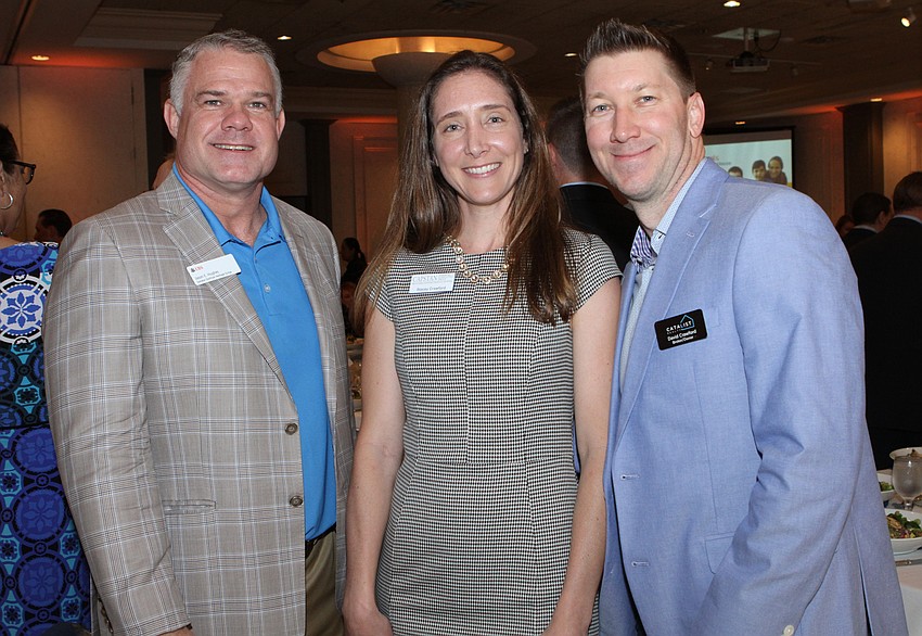Co-chairman Jason Hughes with Stacey and David Crawford