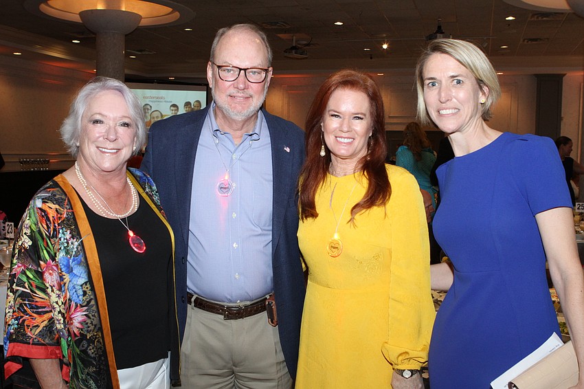 Sherry and Tom Koski with honorary chairwoman Terri Klauber and Gray VIdenka