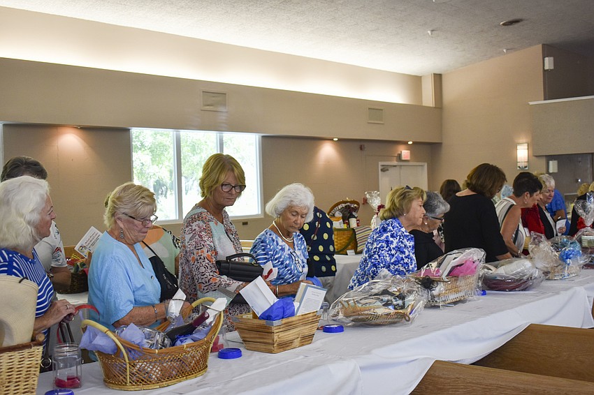 The women were able to start looking through the silent auction items at 10 a.m.
