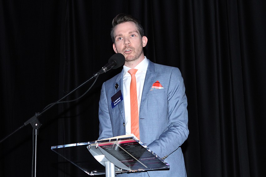 Board Chair Boyd Lindsley started off the program.