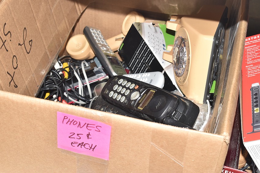 Boxes of cheap items could be pulled onto the tables to replenish what had been purchased.