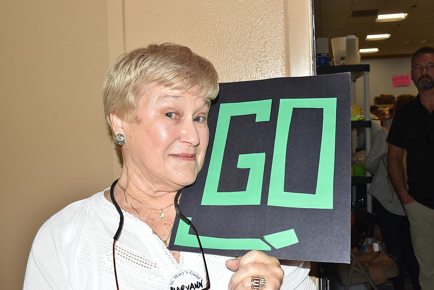 Maryann Simpson was crowd control for the sale.