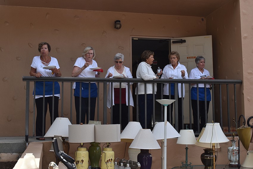 Volunteers take a break with food.