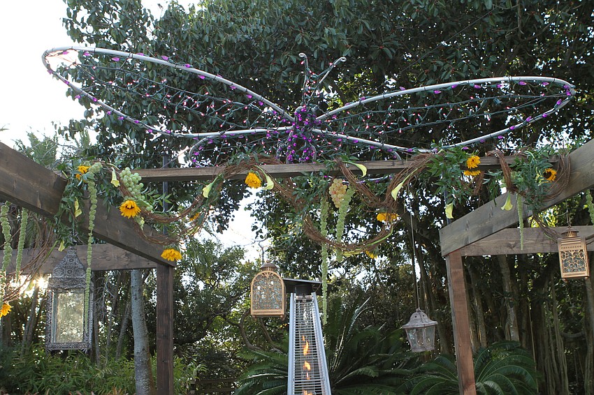 The table had large butterflies hanging overhead
