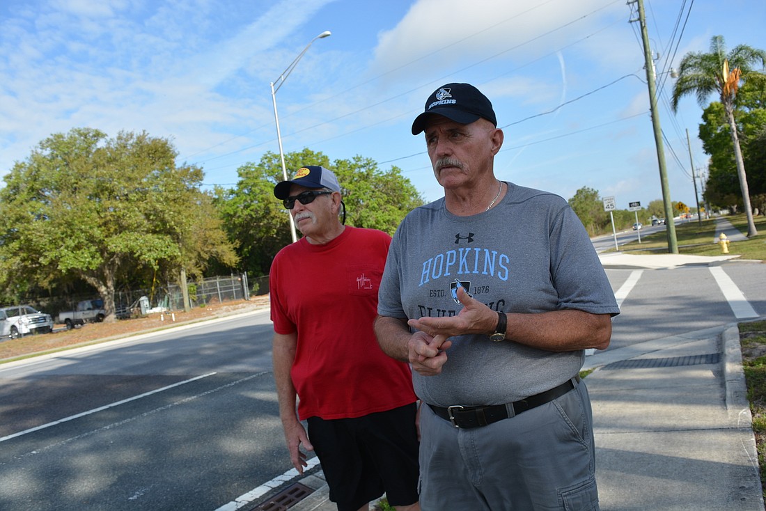 Windsong Acres residents Arlan Cummings and Howard Duff say widening Upper Manatee River Road would help with congestion, but they are still worried about safe access to their neighborhood.