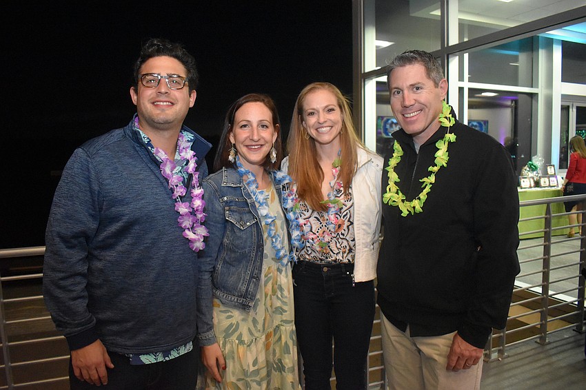 Evan and Rachel Benderson with Dana and Doug Fabiani