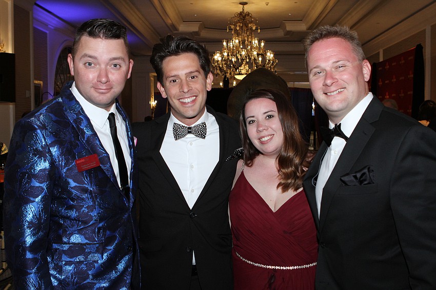 Benjamin Luczak and Jimy Raymond with Jamie and Nick Luczak