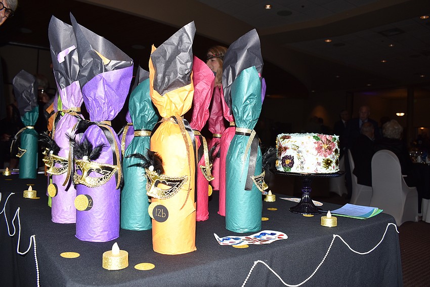 Even the wine bottles available for members wore masks.