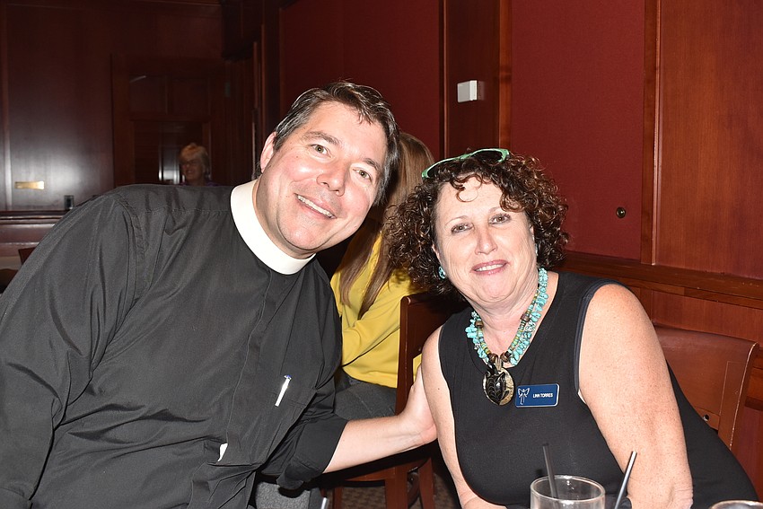 Father Dave Marshall and Linn Torres