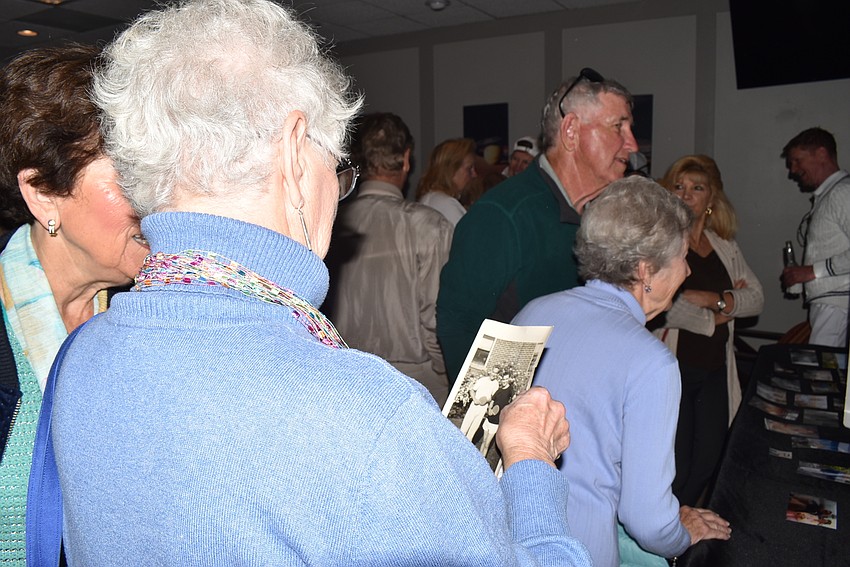Jane Goodwin shows a photo of George Grisdale.