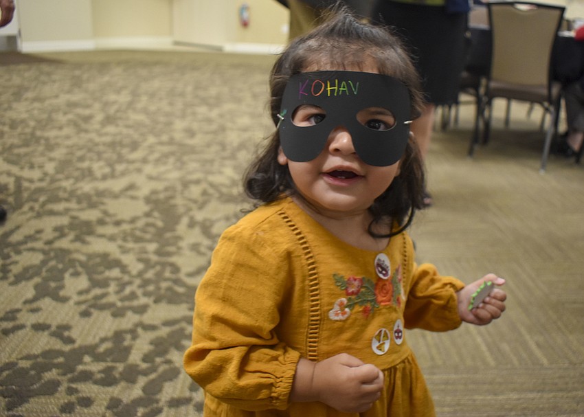 Kohav Weiman, 1, rocks her Purim mask.